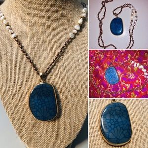 Handmade necklace w/ stained blue crystal pendant